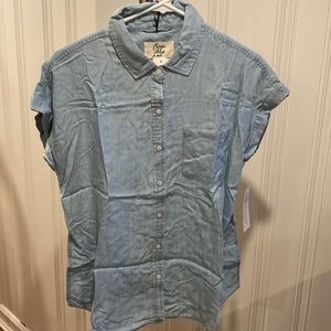 New with tags. Light weight denim blouse.